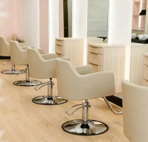 Beige Hair Salon Chair 360 Swivel Adjustable Hydraulic Barber Styling Chair for Modern Salon