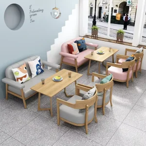 China Modern Wood Restaurant Furniture Set Table and Chairs with Soft Design for Coffee Shop and Hotel Use