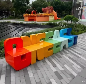 Custom Alphabet Letter Fiberglass Sculpture Bench Outdoor Urban Street Furniture for Theme Park Commercial Mall Plaza Decor