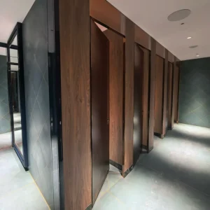 Structurally Stable DEBO Full Height Laminated HPL Toilet Cubicle Partitions for School Use Hygienic Waterproof Graphic Design